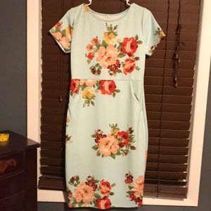 Mint flower print dress with pockets.